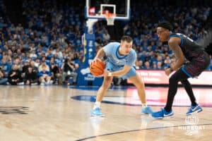 Creighton Bluejays Steven Ashworth looks to pass during a college basketball game against Depaul on February 26th, 2025 in Omaha Nebraska. Photo by Brandon Tiedemann.