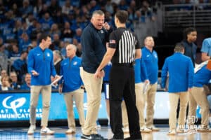 Creighton Bluejays head coach Greg McDermott talks with refs during a college basketball game against Depaul on February 26th, 2025 in Omaha Nebraska. Photo by Brandon Tiedemann.
