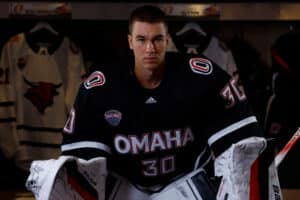 Simon Latkoczy poses during locker room photoshoot on Sept. 15, 2024, in Omaha, Nebraska. Photo John S. Peterson.