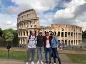 Latkoczy's family poses in front of the Coliseum in Rome