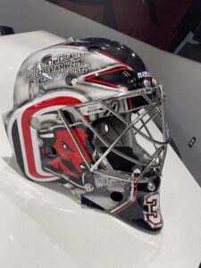 Simon Latkoczy's freshman year hockey helmet with Neries lyrics painted on the side.