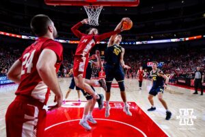 Nebraska Cornhusker center Braxton Meah (34) and Michigan Wolverine center Vladislav Goldin (50) go after a rebound in the second half during a college men’s basketball game Monday, February 24, 2025 in Lincoln, Nebraska. Photo by John S. Peterson.