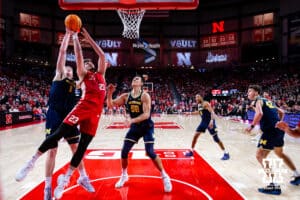 Nebraska Cornhusker forward Andrew Morgan (23) makes a layup against the Michigan Wolverines in the first half during a college men’s basketball game Monday, February 24, 2025 in Lincoln, Nebraska. Photo by John S. Peterson.