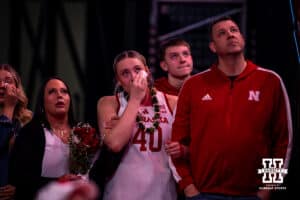 Nebraska Cornhusker center Alexis Markowski (40) wipes a tear away during the Senior Day celebration after a college women’s basketball game against the Washington Huskies Sunday, February 23, 2025 in Lincoln, Nebraska. Photo by John S. Peterson.