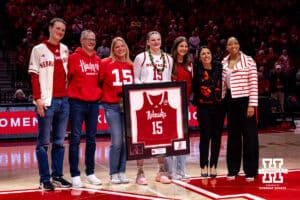 Nebraska Cornhusker guard Kendall Moriarty (15) poses with her family for Senior Day after a college women’s basketball game against the Washington Huskies Sunday, February 23, 2025 in Lincoln, Nebraska. Photo by John S. Peterson.