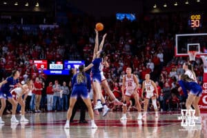 Nebraska Cornhusker center Alexis Markowski (40) wins the tip-off against Washington Huskies forward Dalayah Daniels (14) during a college women’s basketball game Sunday, February 23, 2025 in Lincoln, Nebraska. Photo by John S. Peterson.