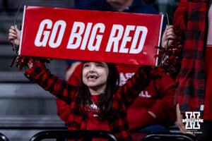Nebraska Cornhuskers fan holding a "Go Big Red" sign against the Washington Huskies during a college women’s basketball game Sunday, February 23, 2025 in Lincoln, Nebraska. Photo by John S. Peterson.