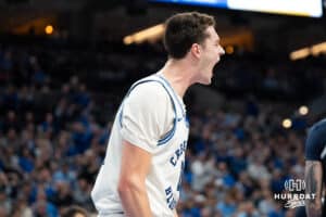 Creighton Bluejays Ryan Kalkbrenner celebrates again after a dunk during a college basketball game against Georgetown on February 23rd, 2025 in Omaha Nebraska. Photo by Brandon Tiedemann.