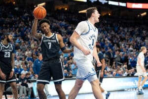 Creighton Bluejays Ryan Kalkbrenner celebrates after making a dunk during a college basketball game against Georgetown on February 23rd, 2025 in Omaha Nebraska. Photo by Brandon Tiedemann.