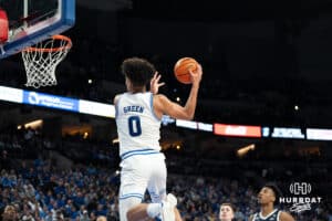 Creighton Bluejays Jasen Green catches a lob during a college basketball game against Georgetown on February 23rd, 2025 in Omaha Nebraska. Photo by Brandon Tiedemann.