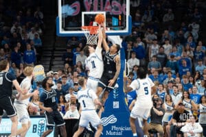 Creighton Bluejays Ryan Kalkbrenner blocks another shot during a college basketball game against Georgetown on February 23rd, 2025 in Omaha Nebraska. Photo by Brandon Tiedemann.