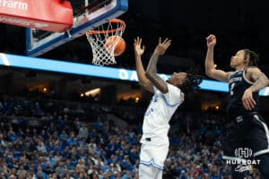 Creighton Bluejays Jamiya Neal looses the ball mid-air during a college basketball game against Georgetown on February 23rd, 2025 in Omaha Nebraska. Photo by Brandon Tiedemann.