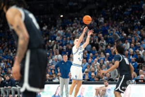 Creighton Bluejays Steven Ashworth shoots a three during a college basketball game against Georgetown on February 23rd, 2025 in Omaha Nebraska. Photo by Brandon Tiedemann.