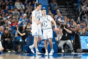 Creighton Bluejays Ryan Kalkbrenner and Steven Ashworth high five before going into halftime during a college basketball game against Georgetown on February 23rd, 2025 in Omaha Nebraska. Photo by Brandon Tiedemann.