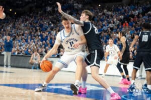 Creighton Bluejays Ryan Kalkbrenner backs down a defender during a college basketball game against Georgetown on February 23rd, 2025 in Omaha Nebraska. Photo by Brandon Tiedemann.