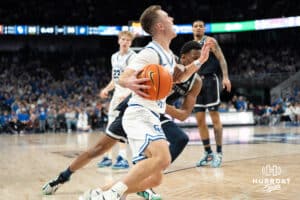Creighton Bluejays Steven Ashworth looks to get a foul called during a college basketball game against Georgetown on February 23rd, 2025 in Omaha Nebraska. Photo by Brandon Tiedemann.