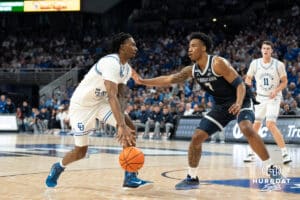 Creighton Bluejays Jamiya Neal looks to get past defenders during a college basketball game against Georgetown on February 23rd, 2025 in Omaha Nebraska. Photo by Brandon Tiedemann.