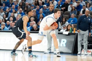 Creighton Bluejays Ryan Kalkbrenner looks to pass during a college basketball game against Georgetown on February 23rd, 2025 in Omaha Nebraska. Photo by Brandon Tiedemann.
