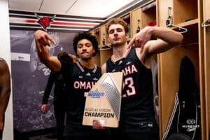 Omaha Mavericks Lance Waddles and Joshua Streit holding the regular season Summit League champion plaque during a basketball game at Baxter Arena on February 22nd, 2025 in Omaha Nebraska. Photo by Collin Stilen.