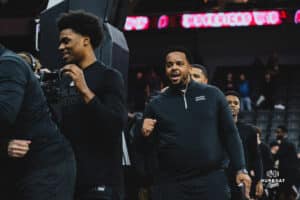 Omaha Maverick assistant coach Josh Crutchfield celebrates during a basketball game at Baxter Arena on February 22nd, 2025 in Omaha Nebraska. Photo by Collin Stilen.