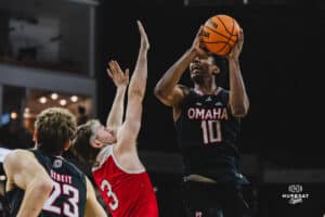 Omaha Maverick Marquel Sutton attempts to shoot the basketball during a basketball game at Baxter Arena on February 22nd, 2025 in Omaha Nebraska. Photo by Collin Stilen.