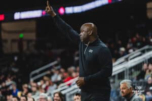 Omaha Maverick head coach Chris Crutchfield gives a play singal during a basketball game at Baxter Arena on February 22nd, 2025 in Omaha Nebraska. Photo by Collin Stilen.