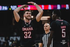 Omaha Maverick Tony Osburn hyping up the arena during a basketball game at Baxter Arena on February 22nd, 2025 in Omaha Nebraska. Photo by Collin Stilen.