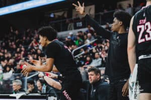 Omaha Mavericks celebrate a three pointer during a basketball game at Baxter Arena on February 22nd, 2025 in Omaha Nebraska. Photo by Collin Stilen.