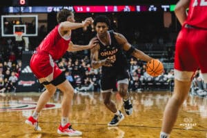 Omaha Maverick Marquel Sutton drives to the bucket during a basketball game at Baxter Arena on February 22nd, 2025 in Omaha Nebraska. Photo by Collin Stilen.