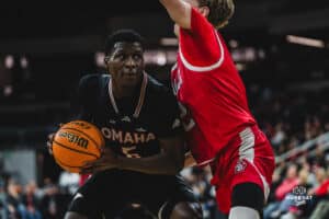 Omaha Maverick Ja'Sean Glover bodies his way to the basket during a basketball game at Baxter Arena on February 22nd, 2025 in Omaha Nebraska. Photo by Collin Stilen.