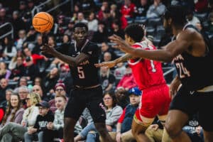 Omaha Maverick Ja'Sean Glover looks for a pass during a basketball game at Baxter Arena on February 22nd, 2025 in Omaha Nebraska. Photo by Collin Stilen.
