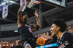 Omaha Maverick Marquel Sutton dunks the ball during a basketball game at Baxter Arena on February 22nd, 2025 in Omaha Nebraska. Photo by Collin Stilen.