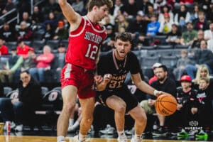 Omaha Maverick Tony Osburn looks to drive to the bucket during a basketball game at Baxter Arena on February 22nd, 2025 in Omaha Nebraska. Photo by Collin Stilen.
