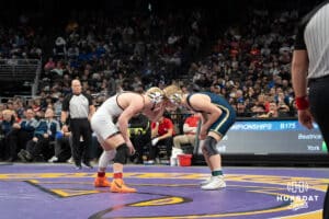 Merrick Johnson and Brooks Loosvelt face off during the 2025 Nebraska State Wrestling Championships on February 22nd, 2025 in Omaha Nebraska. Photo by Brandon Tiedemann.