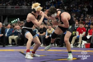 Kyle Lauridsen attacks oppenent during the 2025 Nebraska State Wrestling Championships on February 22nd, 2025 in Omaha Nebraska. Photo by Brandon Tiedemann.