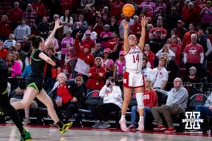 Nebraska Cornhusker guard Callin Hake (14) makes a three-point shot at the end of overtime against the Oregon Ducks during a college women’s basketball game Wednesday, February 19, 2025 in Lincoln, Nebraska. Photo by John S. Peterson.