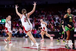 Nebraska Cornhusker guard Logan Nissley (2) celebrates Alberte Rimdal (5) three-point shot against the Oregon Ducks in overtime during a college women’s basketball game Wednesday, February 19, 2025 in Lincoln, Nebraska. Photo by John S. Peterson.