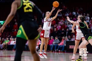 Nebraska Cornhusker guard Alberte Rimdal (5) makes a three-point shot against the Oregon Ducks in overtime during a college women’s basketball game Wednesday, February 19, 2025 in Lincoln, Nebraska. Photo by John S. Peterson.