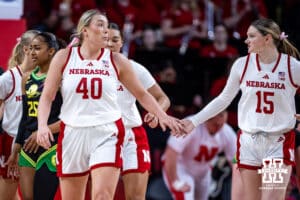 Nebraska Cornhusker center Alexis Markowski (40) and guard Kendall Moriarty (15) give each other five in the third quarter against the Oregon Ducks during a college women’s basketball game Wednesday, February 19, 2025 in Lincoln, Nebraska. Photo by John S. Peterson.