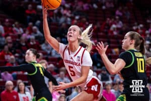 Nebraska Cornhusker guard Alberte Rimdal (5) makes a lay up against Oregon Duck guard Peyton Scott (10) in the first quarter during a college women’s basketball game Wednesday, February 19, 2025 in Lincoln, Nebraska. Photo by John S. Peterson.