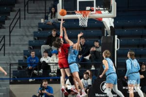 Creighton Bluejays Mallory Brake contests a shot during a college basketball game against St. Johns on February 19th, 2025 in Omaha Nebraska. Photo by Brandon Tiedemann.
