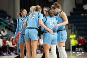 Creighton Bluejays huddle during a college basketball game against St. Johns on February 19th, 2025 in Omaha Nebraska. Photo by Brandon Tiedemann.