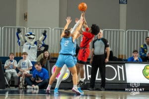 Creighton Bluejays Kennedy Townsend and Morgan Maly contest a shot during a college basketball game against St. Johns on February 19th, 2025 in Omaha Nebraska. Photo by Brandon Tiedemann.