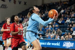Creighton Bluejays Kiani Lockett shoots a lay up during a college basketball game against St. Johns on February 19th, 2025 in Omaha Nebraska. Photo by Brandon Tiedemann.