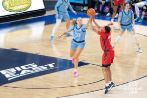 Creighton Bluejays Brooke Littrell contests a shot during a college basketball game against St. Johns on February 19th, 2025 in Omaha Nebraska. Photo by Brandon Tiedemann.