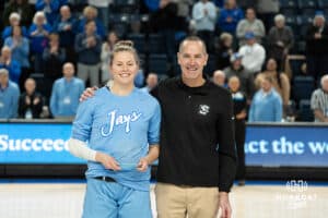 Creighton Bluejays Morgan Maly honored before a college basketball game against St. Johns on February 19th, 2025 in Omaha Nebraska. Photo by Brandon Tiedemann.