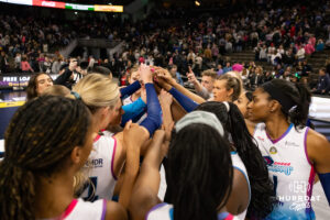 Omaha Supernovas huddle up after the sweep against the San Diego Mojo during a professional volleyball match Sunday, February 16, 2025 in Omaha, Nebraska. Photo by John S. Peterson.