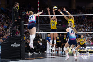 Omaha Supernovas Lindsay Krause (22) spikes the ball against San Diego Mojo Sarah Sponcil (24) in the third set during a professional volleyball match Sunday, February 16, 2025 in Omaha, Nebraska. Photo by John S. Peterson.