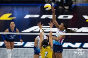 Omaha Supernovas Kaitlyn Hord (23) spikes the ball against San Diego Mojo Ronika Stone (7) in the second set during a professional volleyball match Sunday, February 16, 2025 in Omaha, Nebraska. Photo by John S. Peterson.