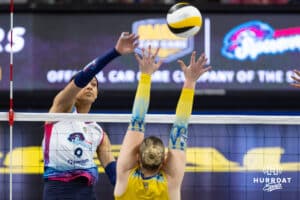 Omaha Supernovas Reagan Cooper (8) spikes the ball against San Diego Mojo Kayla Lund (28) during a professional volleyball match Sunday, February 16, 2025 in Omaha, Nebraska. Photo by John S. Peterson.